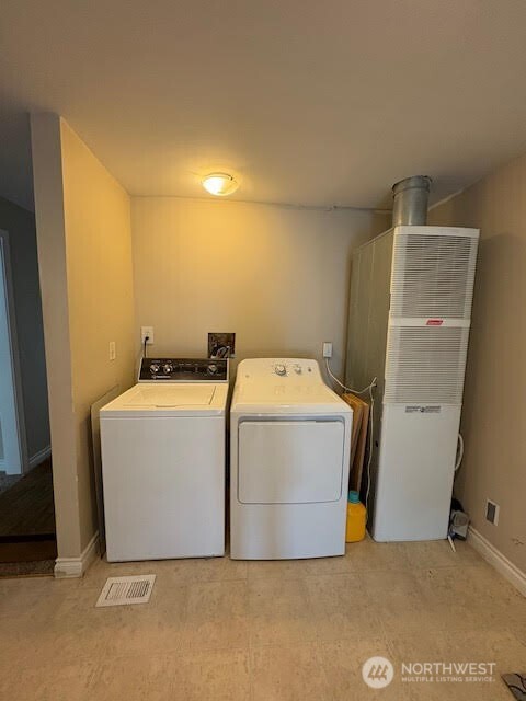 7301 Northeast 175th Street, Unit 137 Kenmore, WA 98028 - Photo 11 of 24 a utility room with dryer and washer