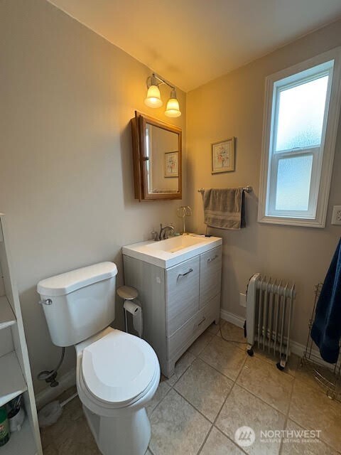7301 Northeast 175th Street, Unit 137 Kenmore, WA 98028 - Photo 14 of 24 a bathroom with a toilet sink and mirror