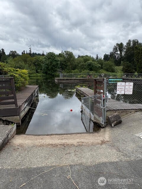 7301 Northeast 175th Street, Unit 137 Kenmore, WA 98028 - Photo 22 of 24 a view of a lake with outdoor space