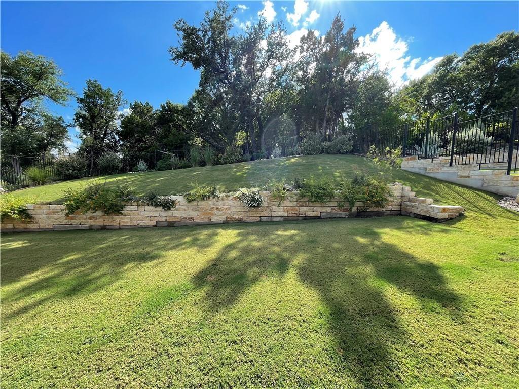 3501 Venezia View Leander, TX 78641 - Photo 18 of 20 a view of a swimming pool with a yard