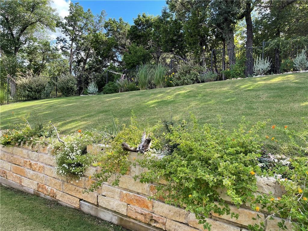 3501 Venezia View Leander, TX 78641 - Photo 20 of 20 a view of a garden with a bench