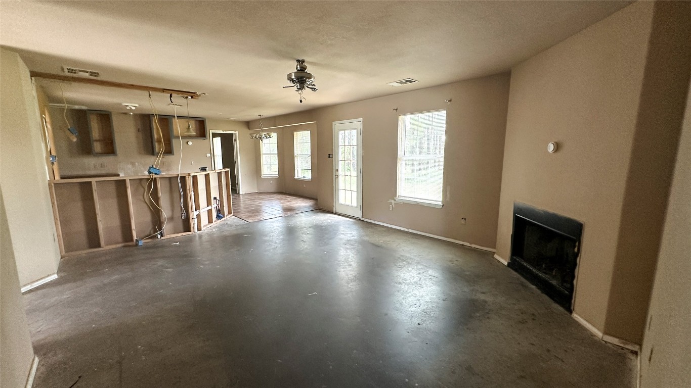 258 Pine View Loop Bastrop, TX 78602 - Photo 11 of 14 an empty room with windows