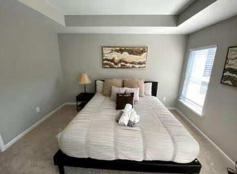 2788 Laurel Ridge Circle Atlanta, GA 30344 - Photo 15 of 16 a bedroom with a bed and a window