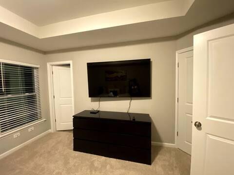 2788 Laurel Ridge Circle Atlanta, GA 30344 - Photo 6 of 16 a living room with a flat screen tv and a couch