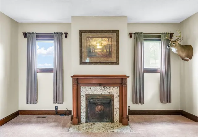 a living room with a fireplace