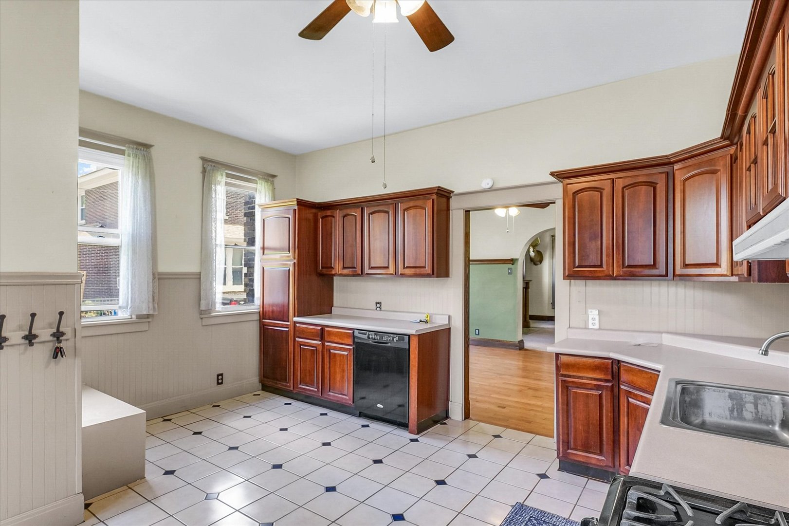 301 North Main Street Fithian, IL 61844 - Photo 16 of 53 a kitchen with stainless steel appliances granite countertop a refrigerator and a stove top oven