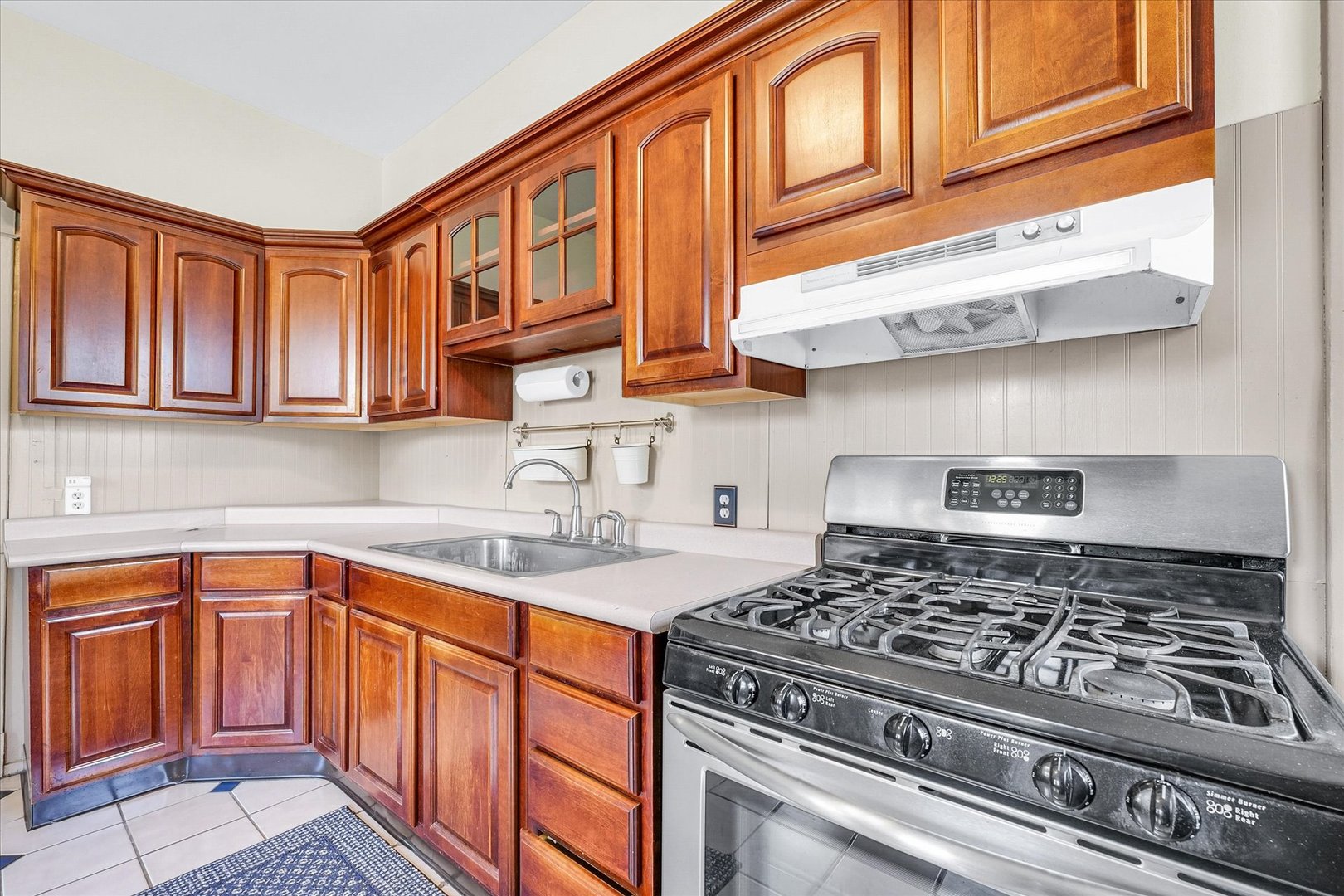 301 North Main Street Fithian, IL 61844 - Photo 18 of 53 a kitchen with stainless steel appliances granite countertop a stove and a sink