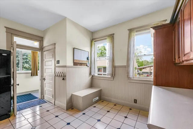 a view of kitchen with furniture and window