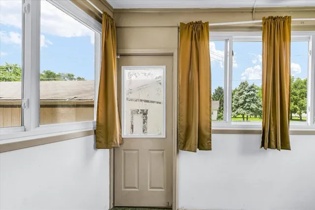 a view of front door with stairs