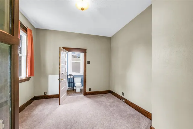 a view of a room with a window