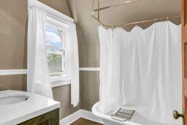 a room with furniture and a flat screen tv