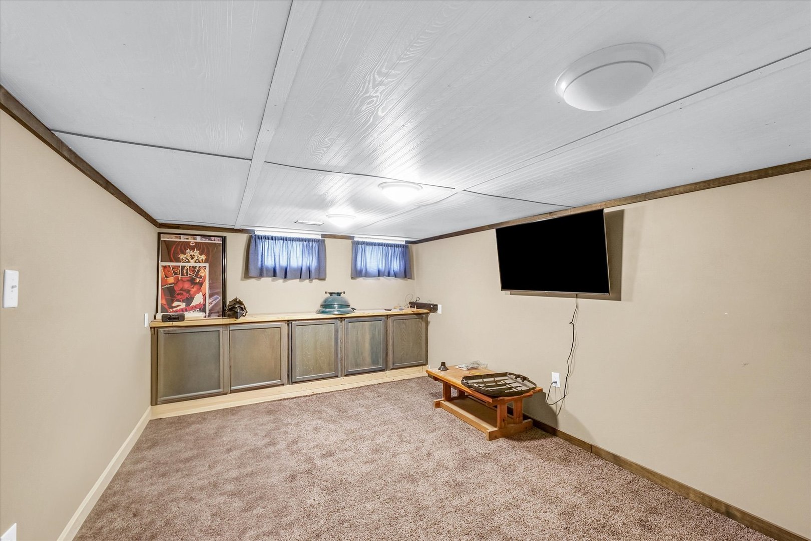 301 North Main Street Fithian, IL 61844 - Photo 37 of 53 a room with furniture and a flat screen tv