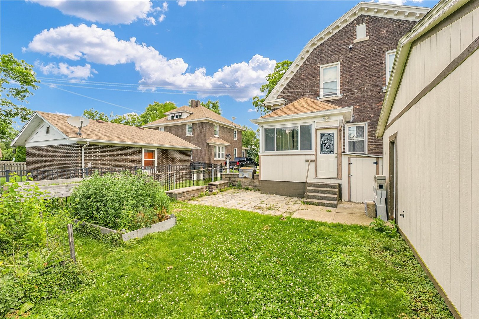 301 North Main Street Fithian, IL 61844 - Photo 52 of 53 a view of a house with a yard and sitting area