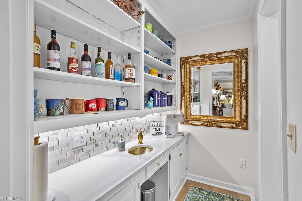 120 Buckhaven Court Rural Hall, NC 27045 - Photo 17 of 47 Just off the dining area you'll find the butler's pantry and extra storage. The pantry finishes coordinate with the kitchen finishes.