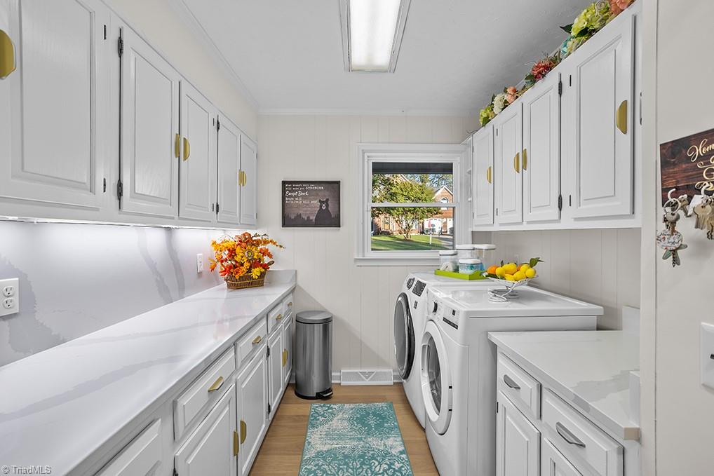 120 Buckhaven Court Rural Hall, NC 27045 - Photo 18 of 47 And the newly updated laundry area coordinates with the kitchen finishes as well. All upgrades have been thoroughly thought out and executed.