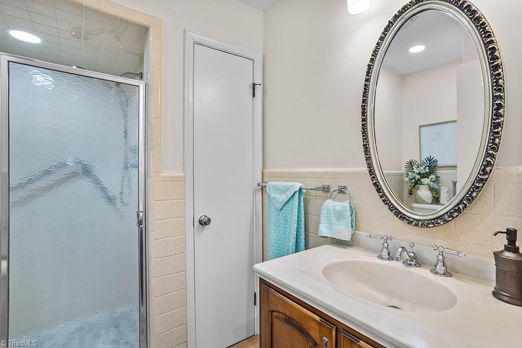 120 Buckhaven Court Rural Hall, NC 27045 - Photo 19 of 47 Across from the laundry room you'll find the 1st of 3 full bathrooms which services the main living space of the home.