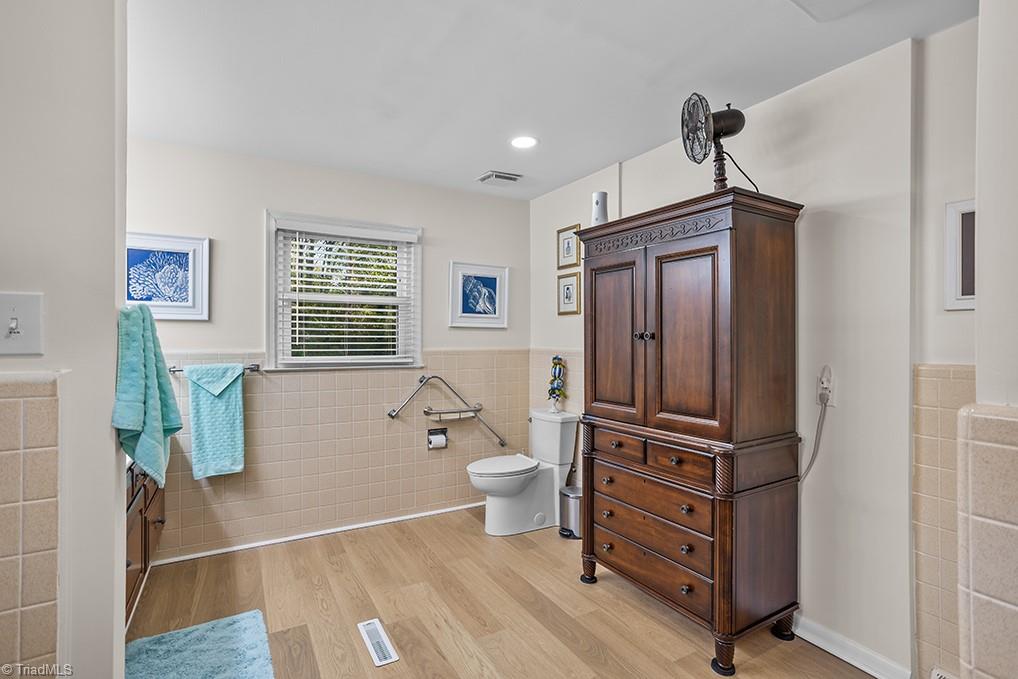 120 Buckhaven Court Rural Hall, NC 27045 - Photo 30 of 47 The primary bathroom offers plenty of space and includes another closet for you to use as needed.