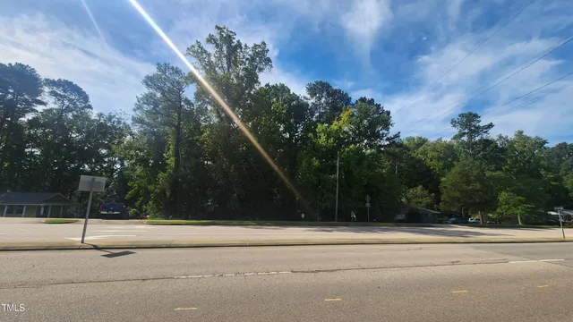 a view of swimming pool and a yard
