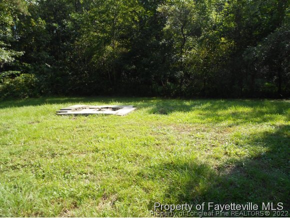 5862 Columbine Road Fayetteville, NC 28306 - Photo 2 of 10 a view of a large yard