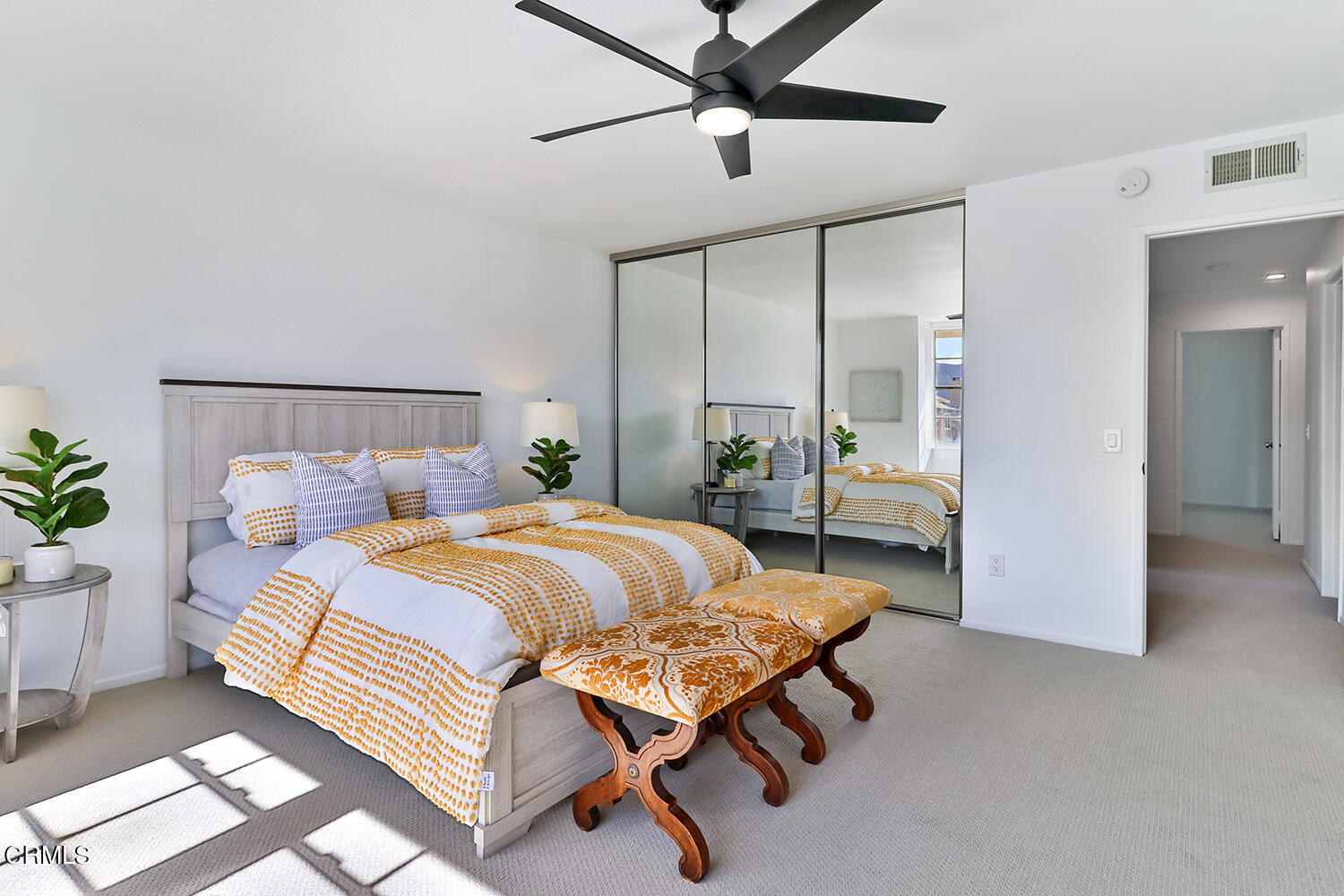 6159 Fremont Circle Camarillo, CA 93012 - Photo 38 of 48 a bedroom with a bed and a chandelier