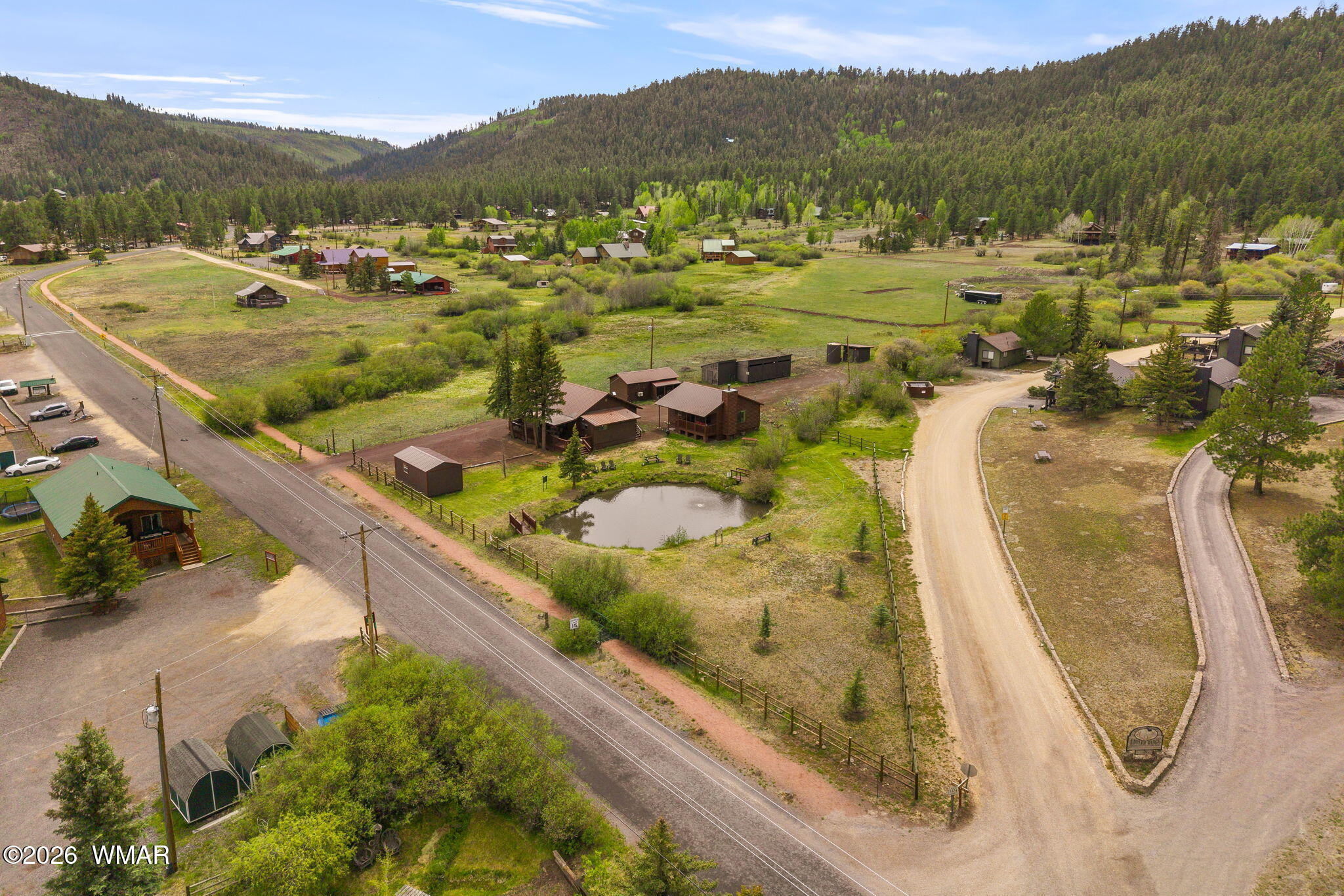 85 Main Street Greer, AZ 85927 - Photo 48 of 55 an aerial view of residential houses with outdoor space