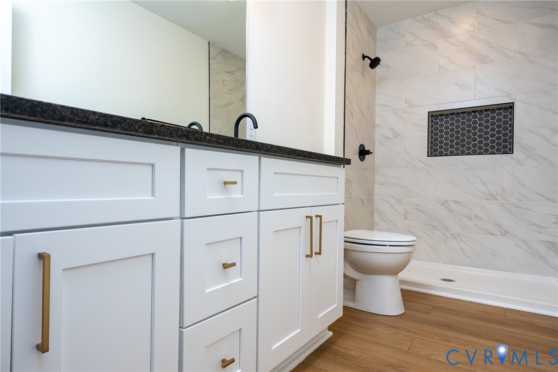 238 Ash Road Louisa, VA 23093 - Photo 19 of 43 a close view of a toilet and a sink