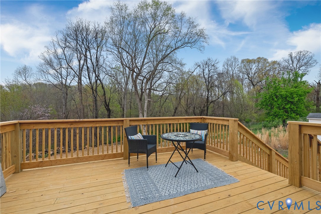 238 Ash Road Louisa, VA 23093 - Photo 27 of 43 a view of backyard with deck and trees