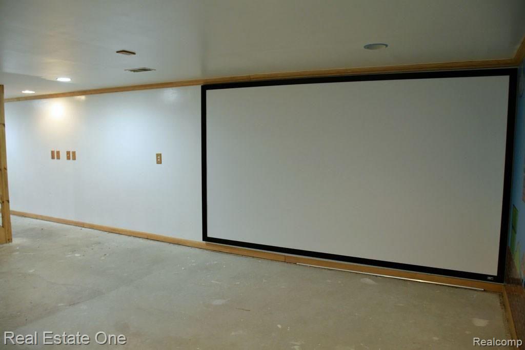 1610 Baldwin Road Lapeer, MI 48446 - Photo 34 of 42 projector screen.jpg