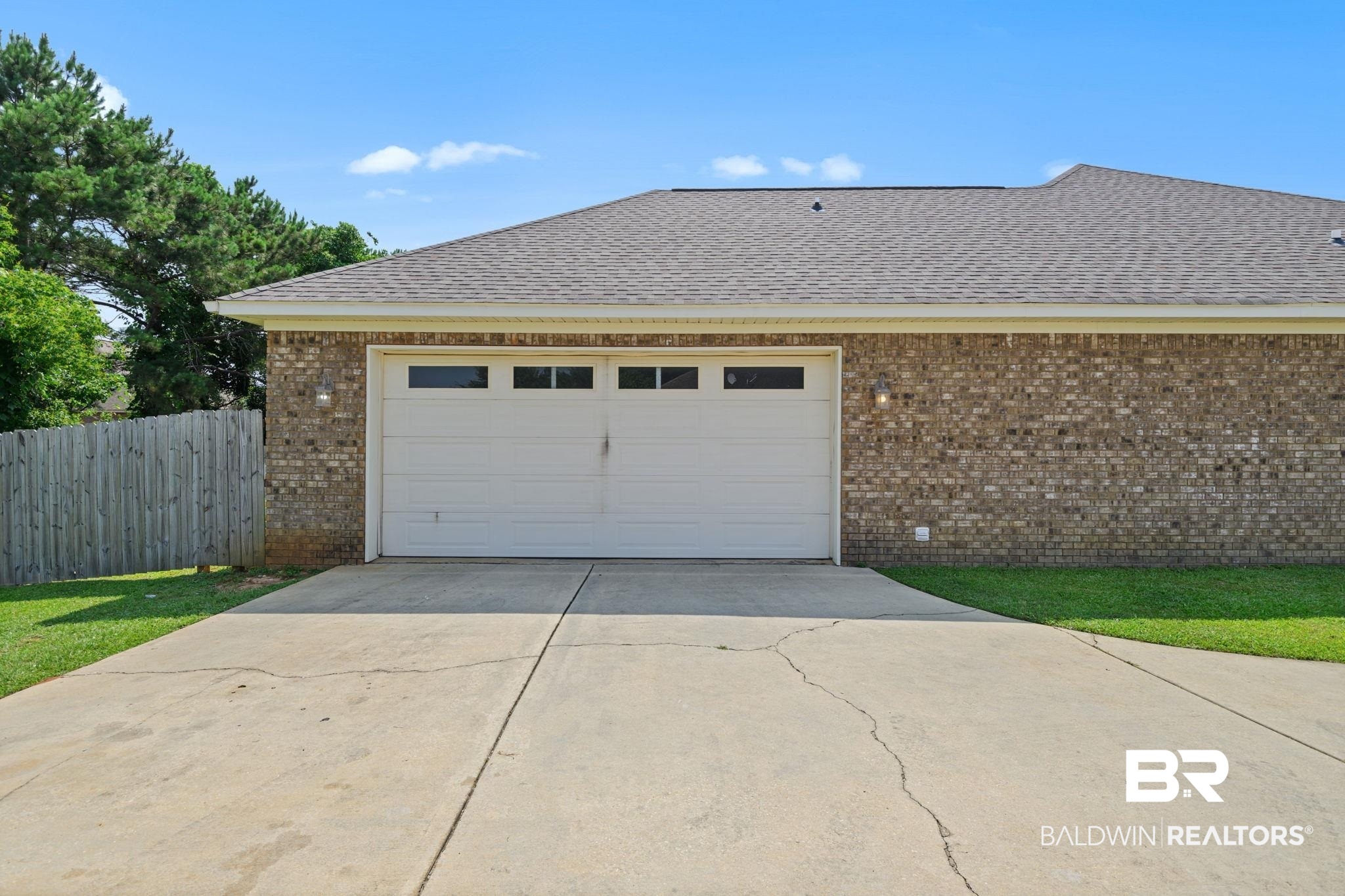 9730 Harmony Ridge Circle West Semmes, AL 36575 - Photo 38 of 38 Garage featuring driveway