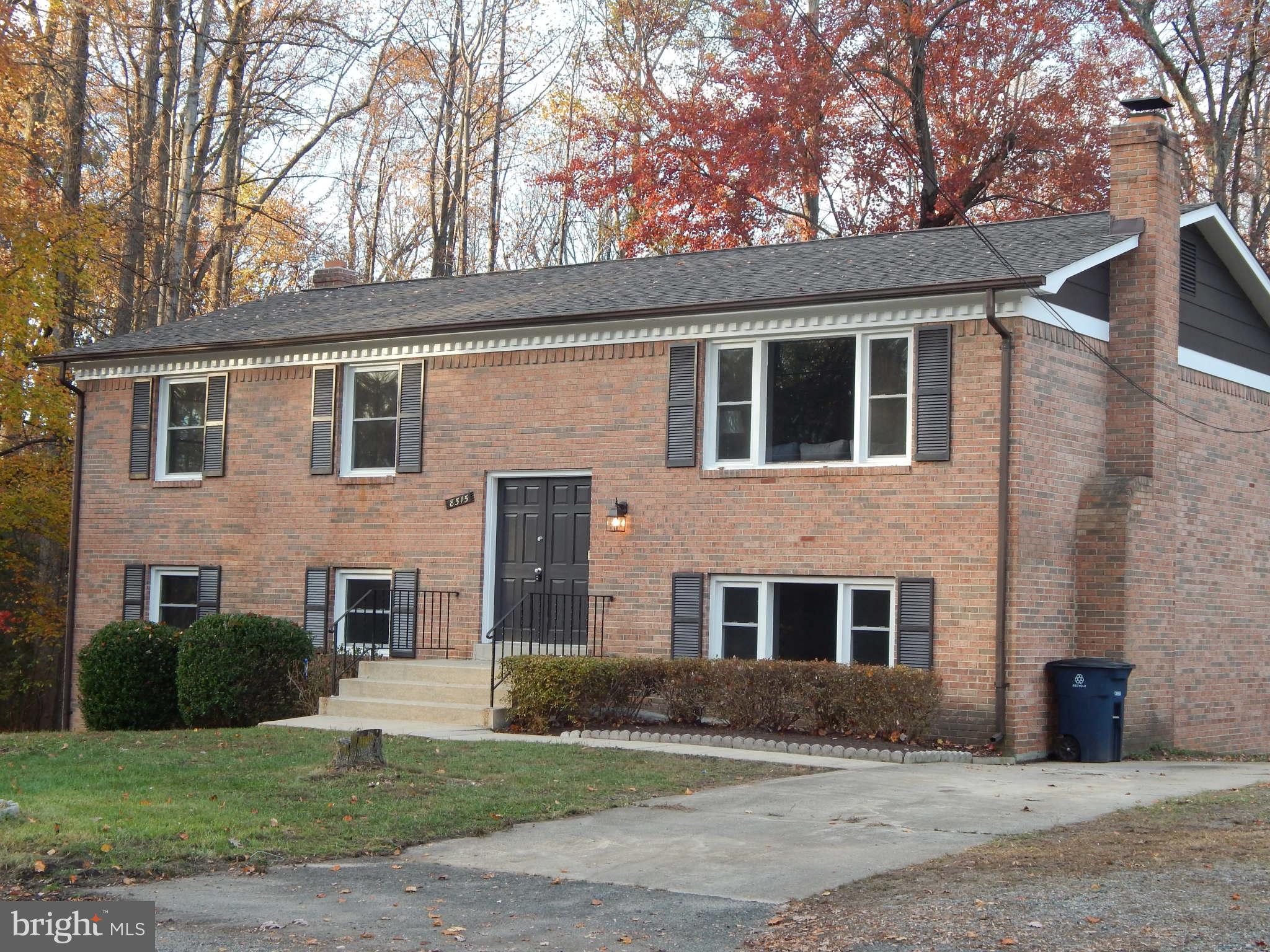 8515 Schultz Road Clinton, MD 20735 - Photo 1 of 30 a front view of a house with a yard