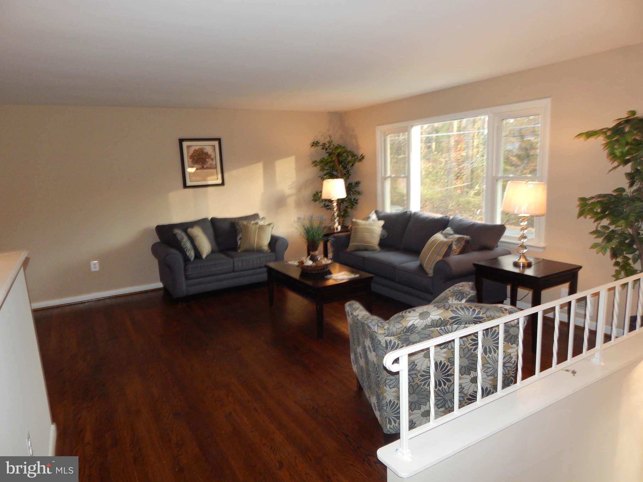 8515 Schultz Road Clinton, MD 20735 - Photo 4 of 30 a living room with furniture and a large window