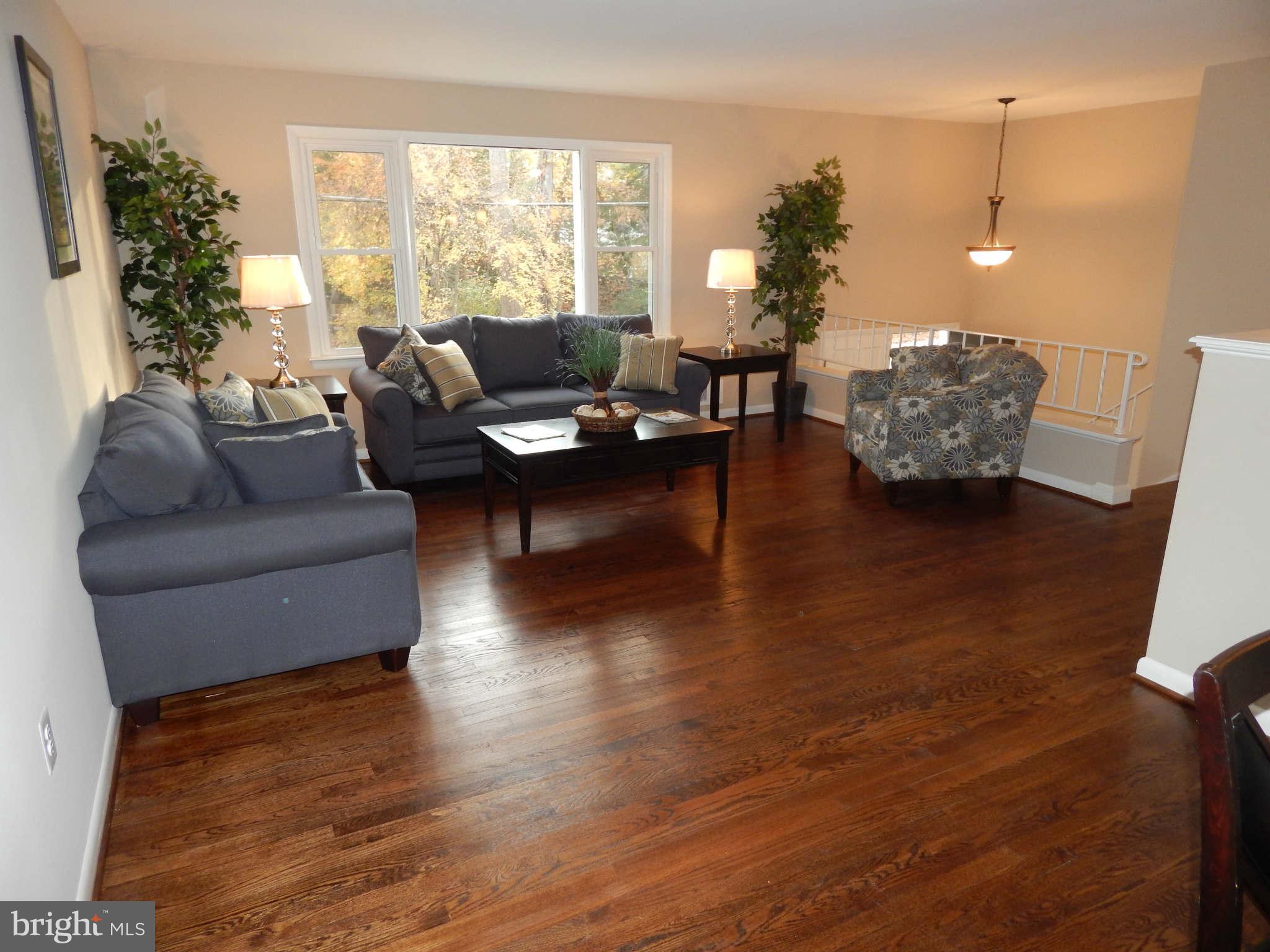 8515 Schultz Road Clinton, MD 20735 - Photo 5 of 30 a living room with furniture and a large window