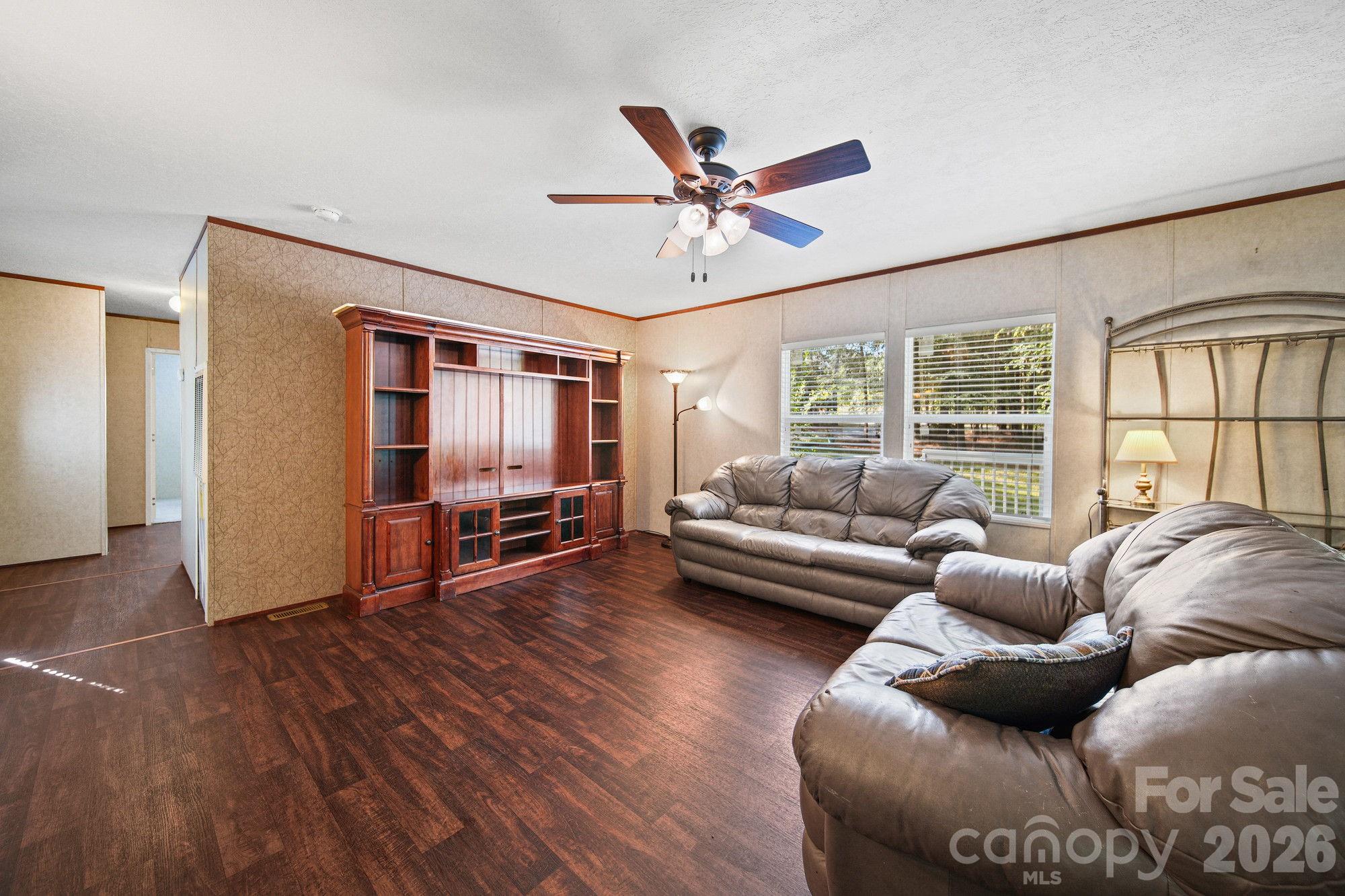 4507 White Store Road Wingate, NC 28174 - Photo 10 of 29 a living room with furniture and a window