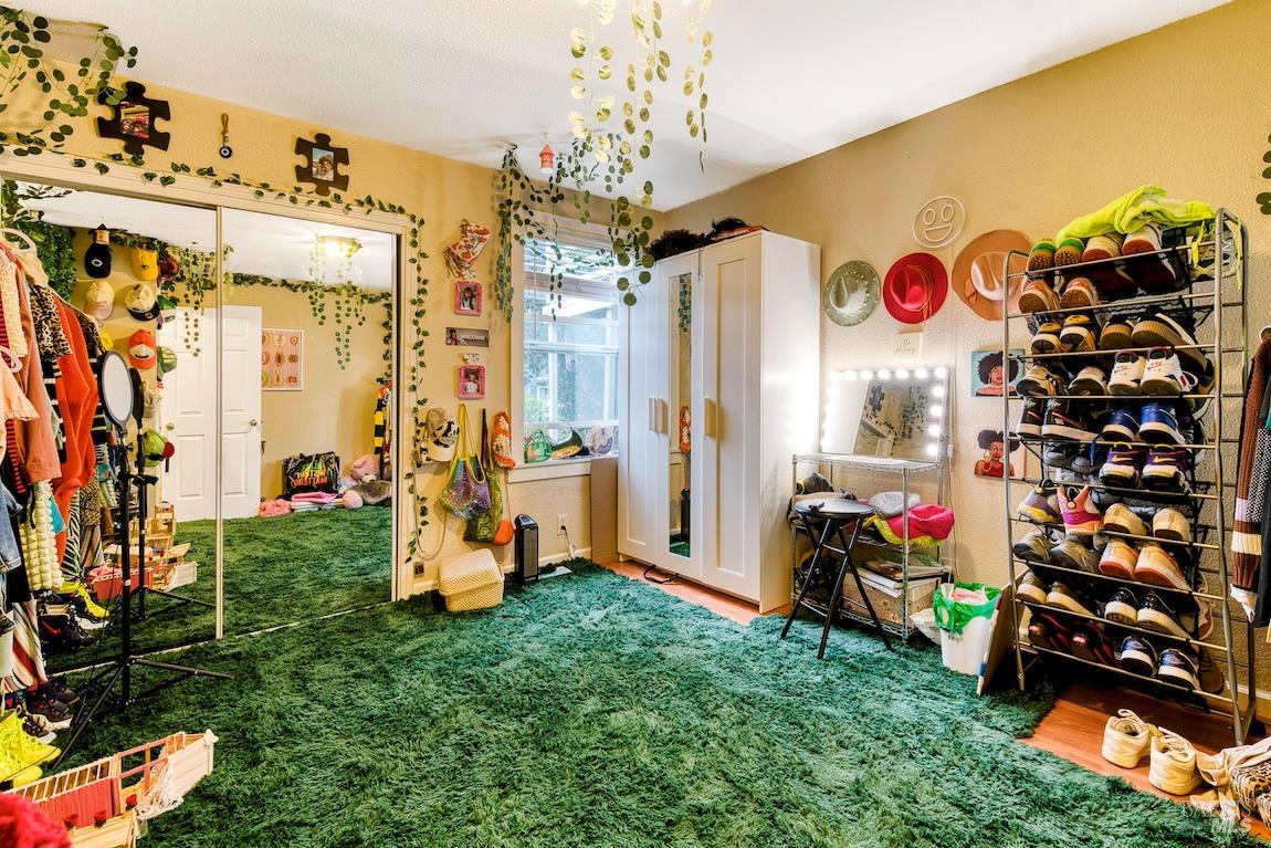 1128 Chester Street Oakland, CA 94607 - Photo 16 of 42 a view of a room with toys and a chandelier