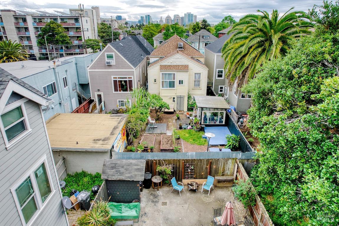 1128 Chester Street Oakland, CA 94607 - Photo 19 of 42 an aerial view of a house with a yard and potted plants