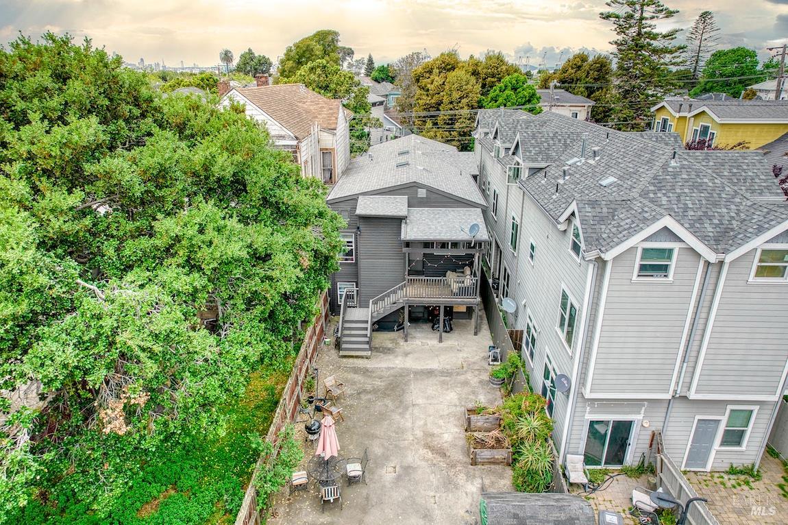 1128 Chester Street Oakland, CA 94607 - Photo 24 of 42 an aerial view of residential houses with outdoor space and trees