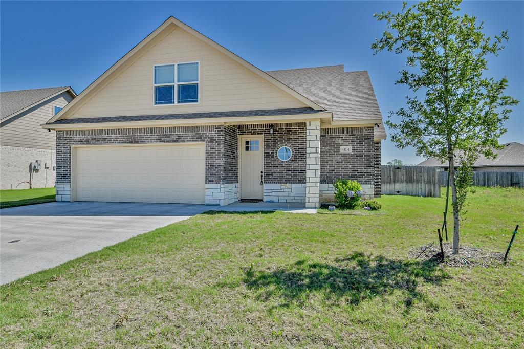 614 Violet Drive Tolar, TX 76476 - Photo 1 of 1 a front view of a house with garden