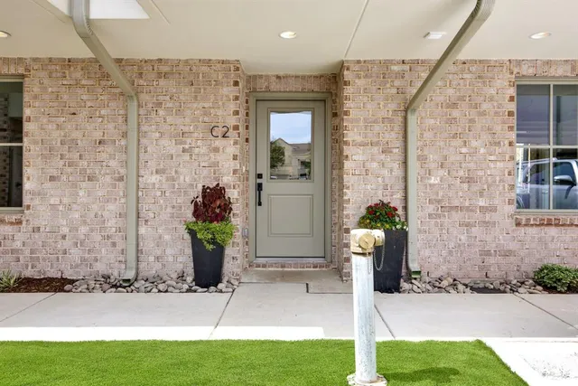 a front view of a house with yard