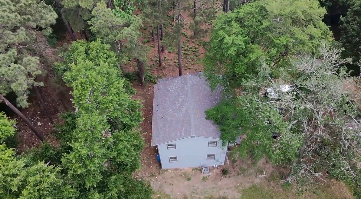117 Amanda Street Conroe, TX 77304 - Photo 12 of 35 an aerial view of a house with yard and outdoor space
