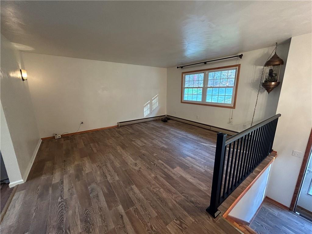 1631 Shady Plain Road Apollo, PA 15613 - Photo 12 of 36 wooden floor in an empty room with a window