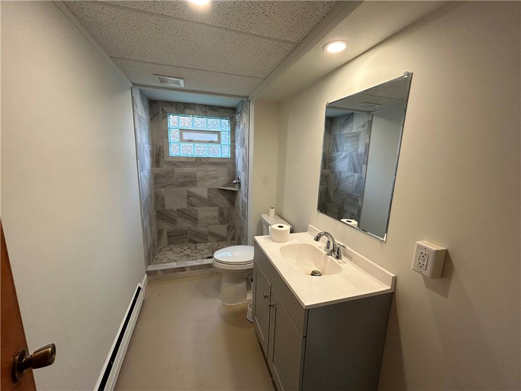 1631 Shady Plain Road Apollo, PA 15613 - Photo 16 of 36 a bathroom with a sink a toilet and shower