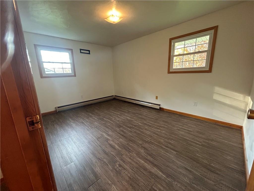 1631 Shady Plain Road Apollo, PA 15613 - Photo 27 of 36 a view of an empty room with wooden floor and a window
