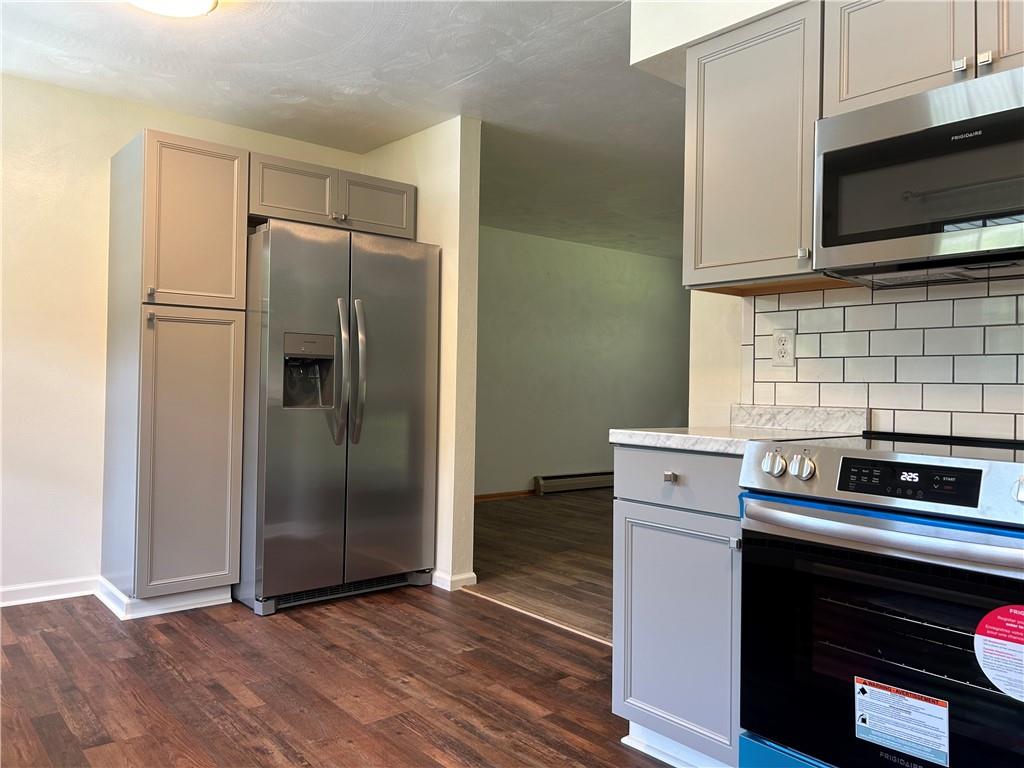 1631 Shady Plain Road Apollo, PA 15613 - Photo 10 of 36 a kitchen with a refrigerator stove and microwave