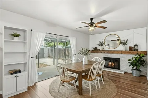 a view of a livingroom with furniture and a fireplace