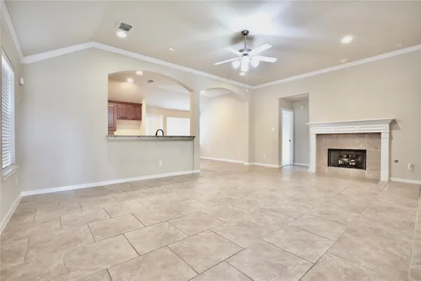 a kitchen with stainless steel appliances kitchen island granite countertop a refrigerator sink and cabinets