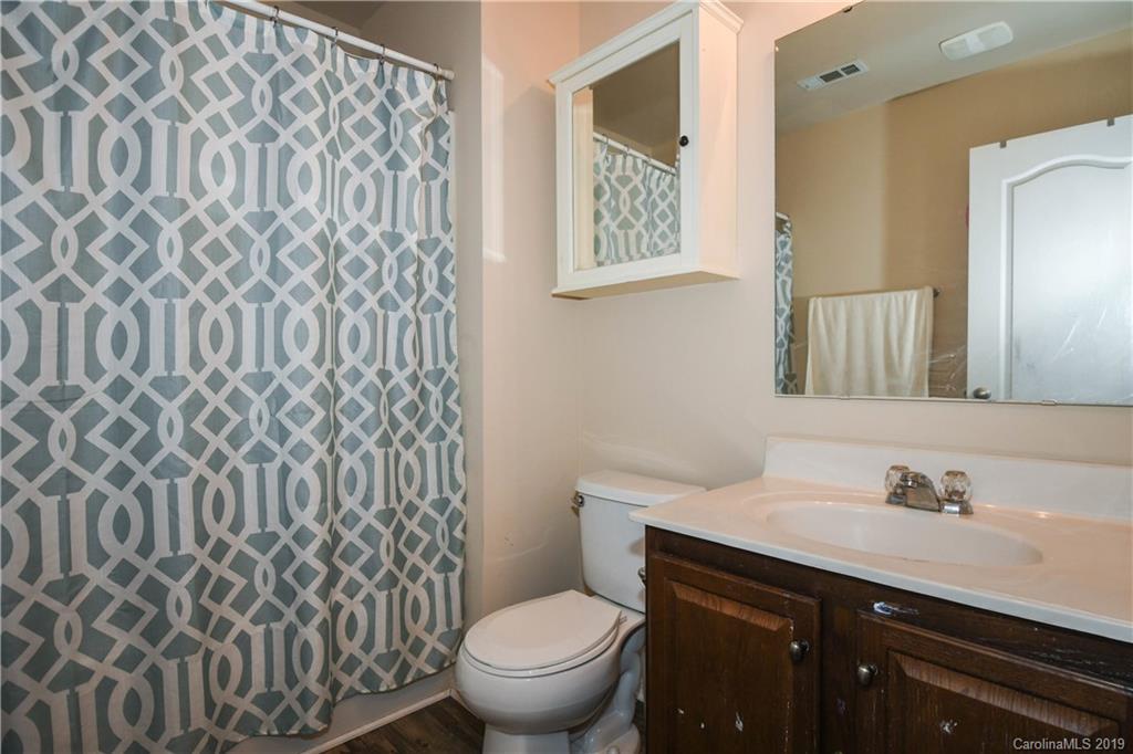 660 Potter Place Road Fort Mill, SC 29708 - Photo 18 of 23 a bathroom with a granite countertop sink and a toilet