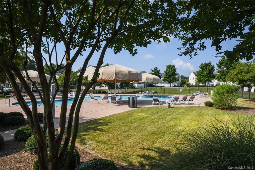 660 Potter Place Road Fort Mill, SC 29708 - Photo 23 of 23 a swimming pool with outdoor seating and yard