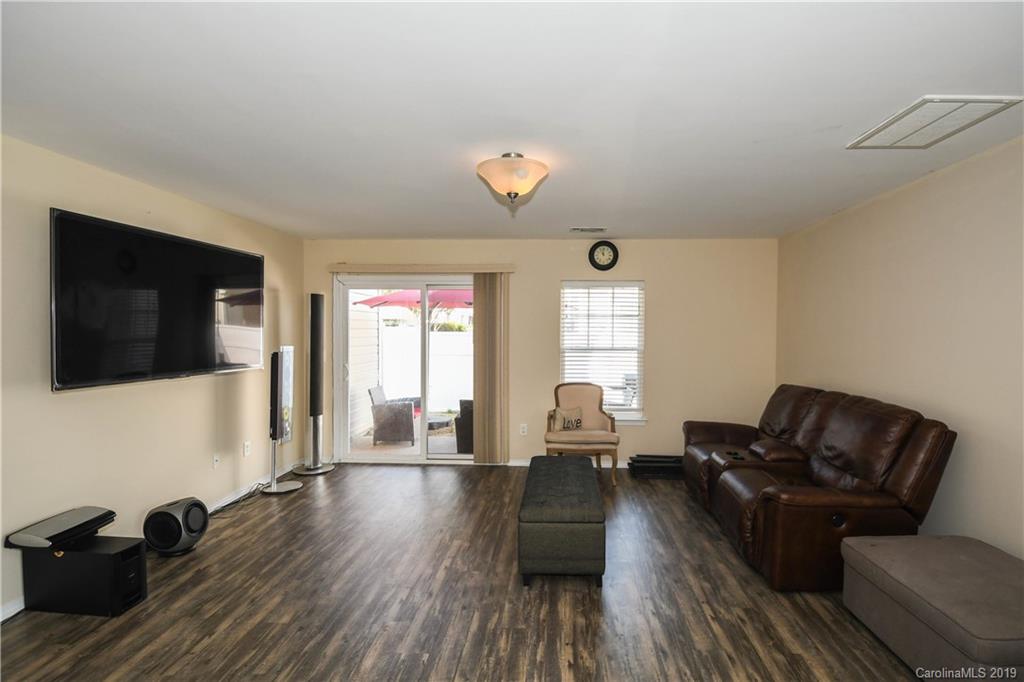 660 Potter Place Road Fort Mill, SC 29708 - Photo 5 of 23 a living room with furniture and a flat screen tv
