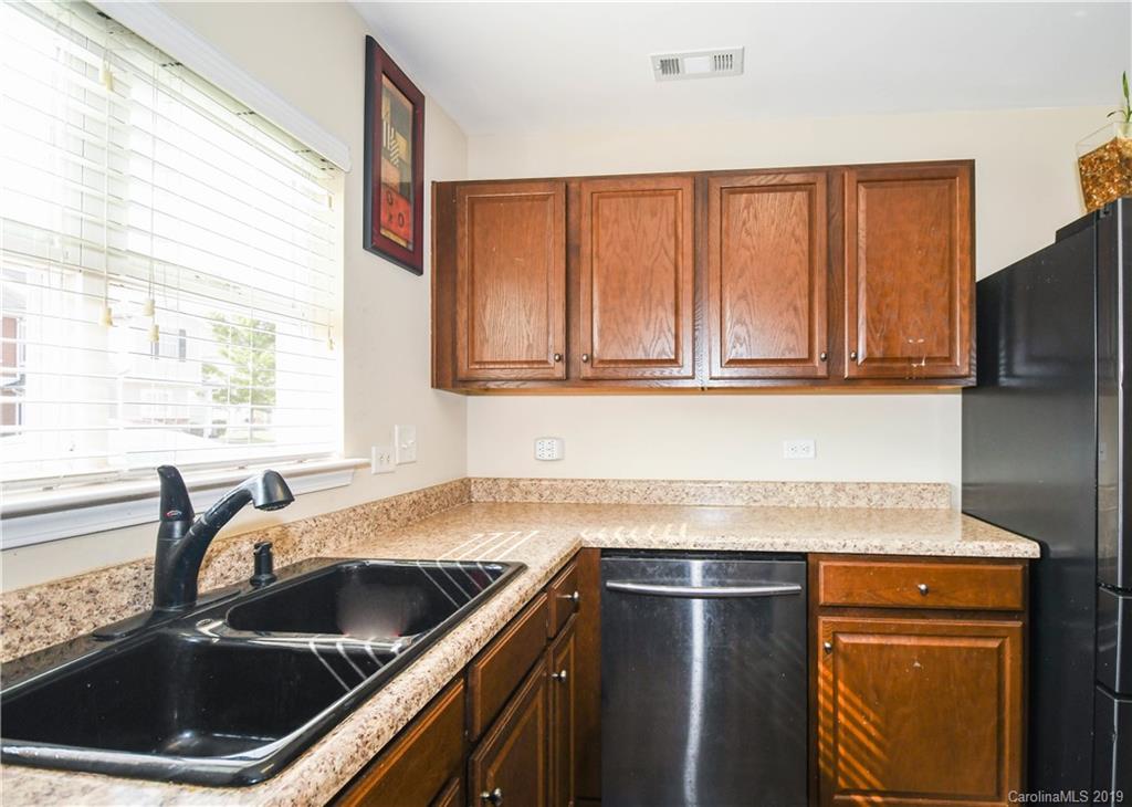 660 Potter Place Road Fort Mill, SC 29708 - Photo 10 of 23 a kitchen with a sink stove and refrigerator