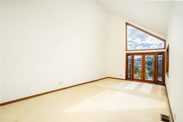 a view of a room with a large window